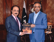 Pakistan Ombudsman Sindh presenting the annual report, and Governor Sindh (from left to right)