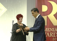 Arman Tatoyan (right) receives PR award