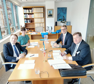 from left to right: IOI President Field, Ms Rebecca Poole, Mr Meinhard Friedl and IOI Secretary General Amon