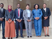 Ombudsman Malera with staff outside of the Parliament
