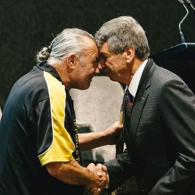 A hongi between a Ngāti Whātua elder (left) and Chief Ombudsman Peter Boshier (right) 