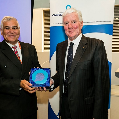 Colin Neave presents a plaque to John Walters