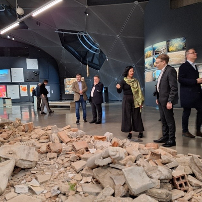 IOI President, Chris Field PSM, undertaking a private guided tour by the Director of the modern art museum, the Kunsthaus Graz