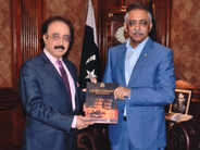 Pakistan Ombudsman Sindh presenting the annual report, and Governor Sindh (from left to right)