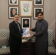 Ombudsman Sindh (left) presents Annual Report to Chief Minister Sindh (right)