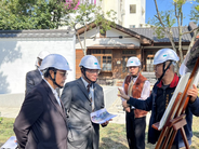 Control Yuan Members learn about the restoration process of Japanese-style dormitories by the Meilun River