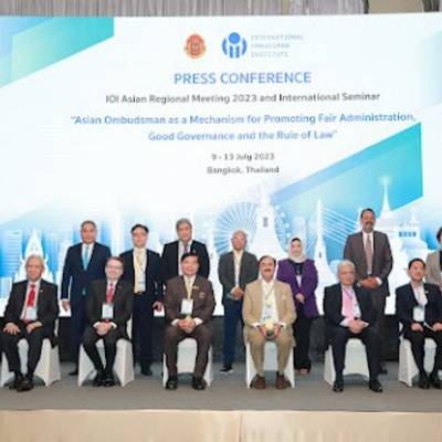 IOI President Chris Field PSM with members of the Press Conference.