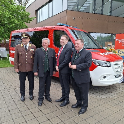 IOI President and Minister Werner Amon at the blessing of a fire engine