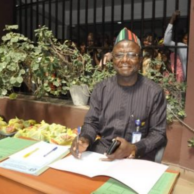 The new Secretary to the Commission, Mr David I.Shagba mni, during the Pen down Ceremony