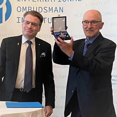 President Field presents Rafael Ribó with the Golden Order of Merit and IOI Honorary Life Membership