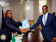 Ombudsman Mr. Melron Nicol-Wilson with His Excellency President Julius Maada Bio