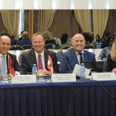 Conference Host Igli Totozani, IOI Secretary General Kräuter, AOMF President Marc Bertrand and Belgian Ombudsman Catherine De Bruecker