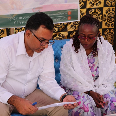 Shiela Caroline Sempa along with Muhammad Saleem (Deputy Director) during their visit to Faisalabad to understand the mechanism and working of the Awami Khidmat Programme